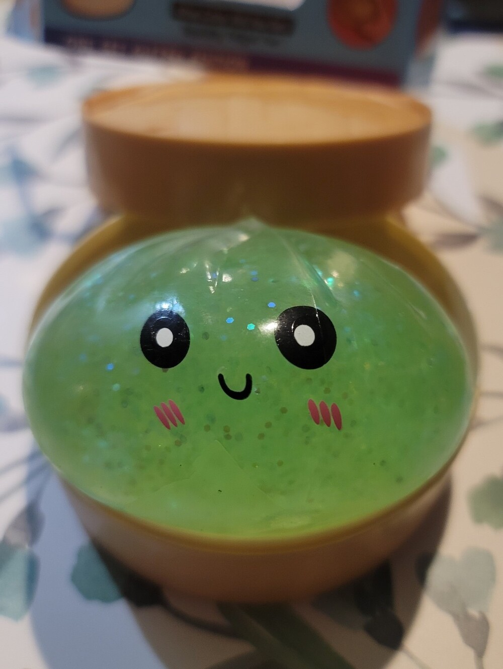 NWT- Green Glitter Squishy Stress Dumpling with Cute Face